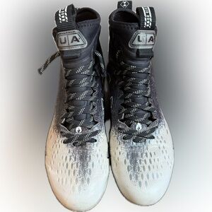 Under Armour Black and Gray High-Top Football Cleats